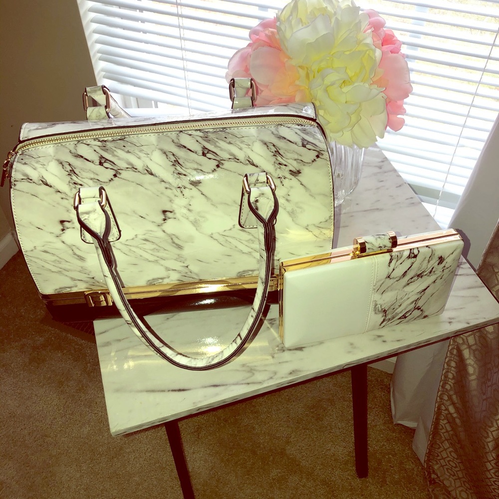 Unique marble print handbag and matching clutch.